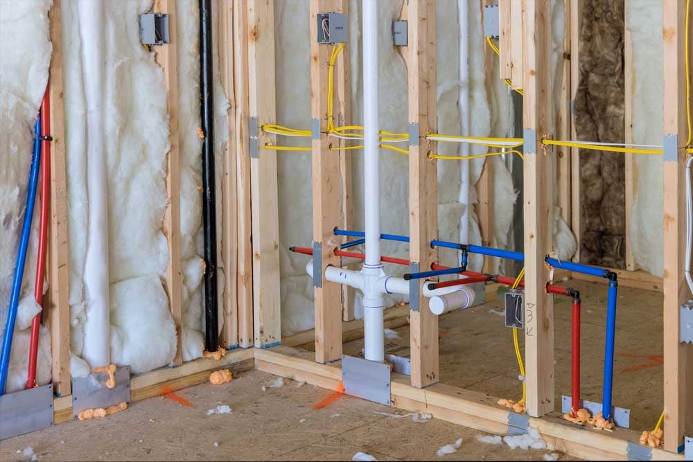 exposed plumbing in remodeled house