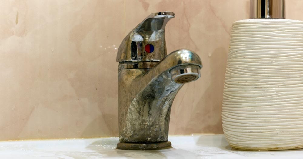 plumbing fixtures with scale buildup