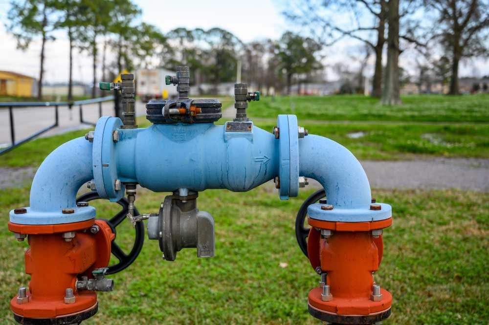 A new backflow preventer being installed