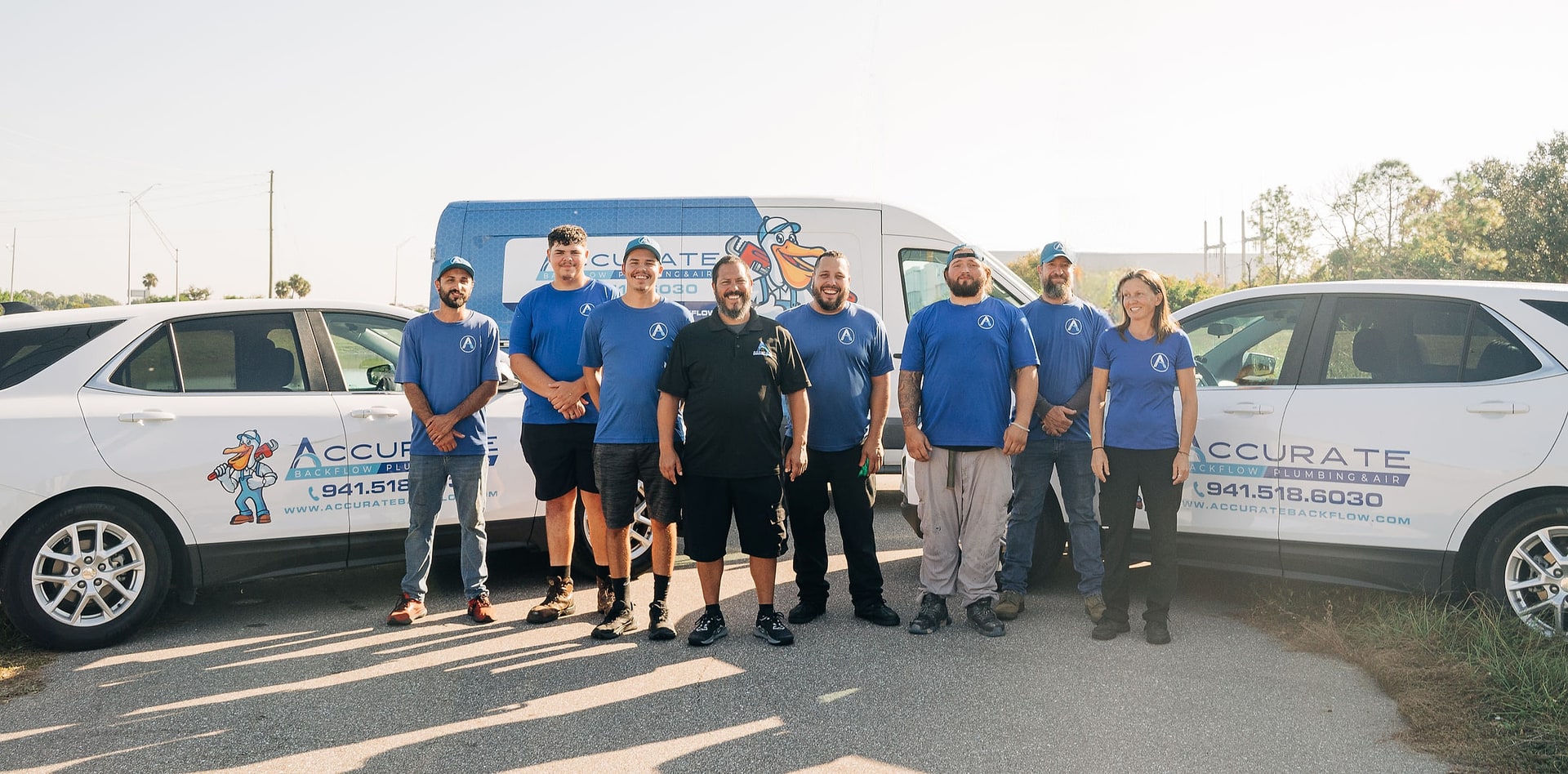 Accurate Backflow & Plumbing technicians with the service fleet