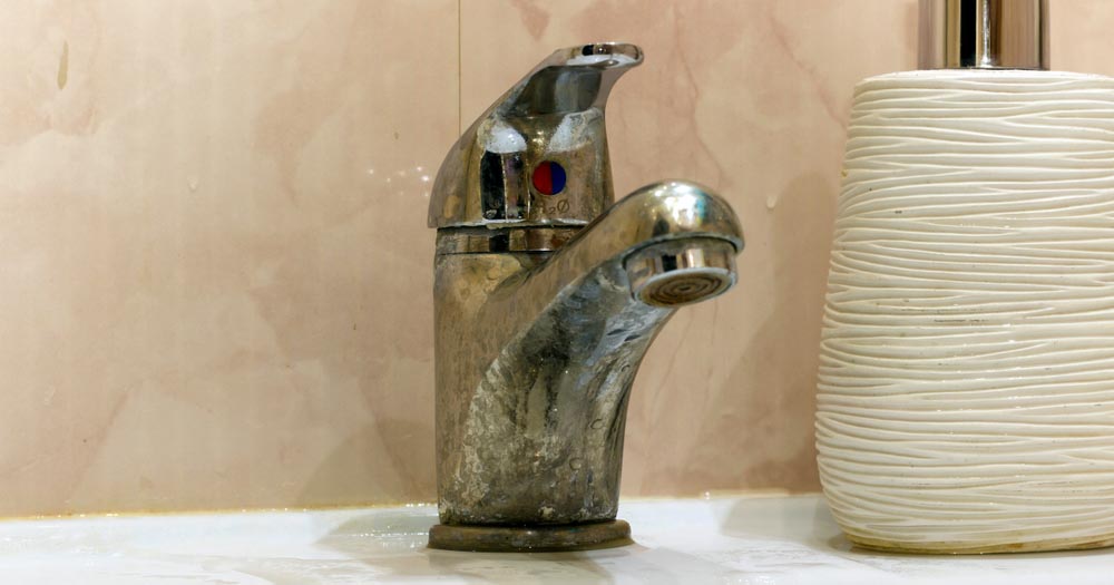 plumbing fixtures with scale buildup